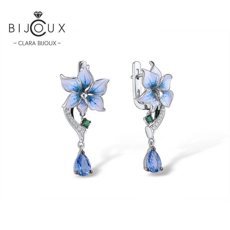 Бутикови сребърни обеци Azure Bloom със сини кристали, бял цирконий, цветен емайл и родиево покритие – Clara Bijoux